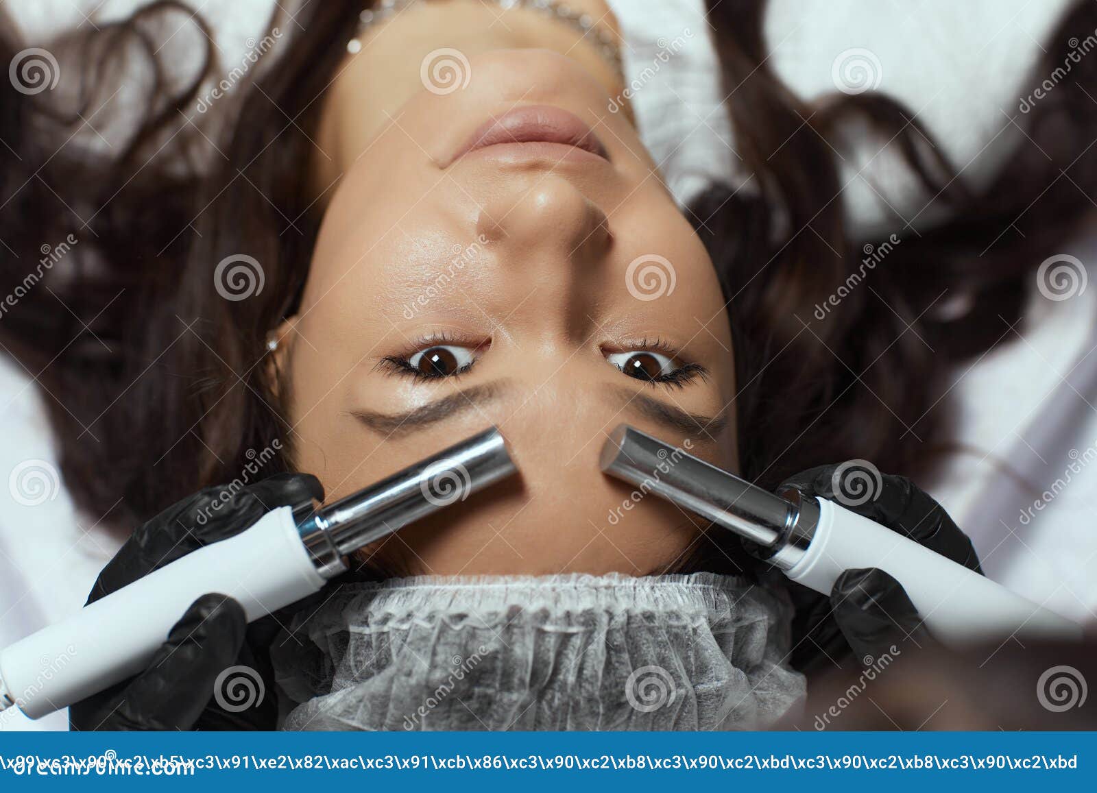 Cosmetology Beautiful Woman At Spa Clinic Receiving Stimulating Electric Facial Treatment From