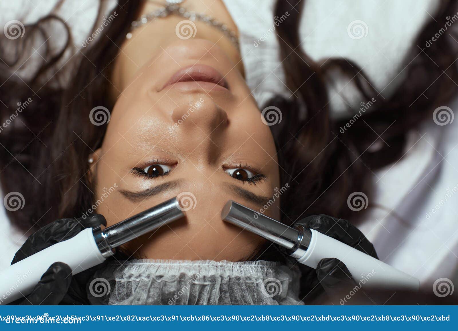 Cosmetology Beautiful Woman At Spa Clinic Receiving Stimulating Electric Facial Treatment From