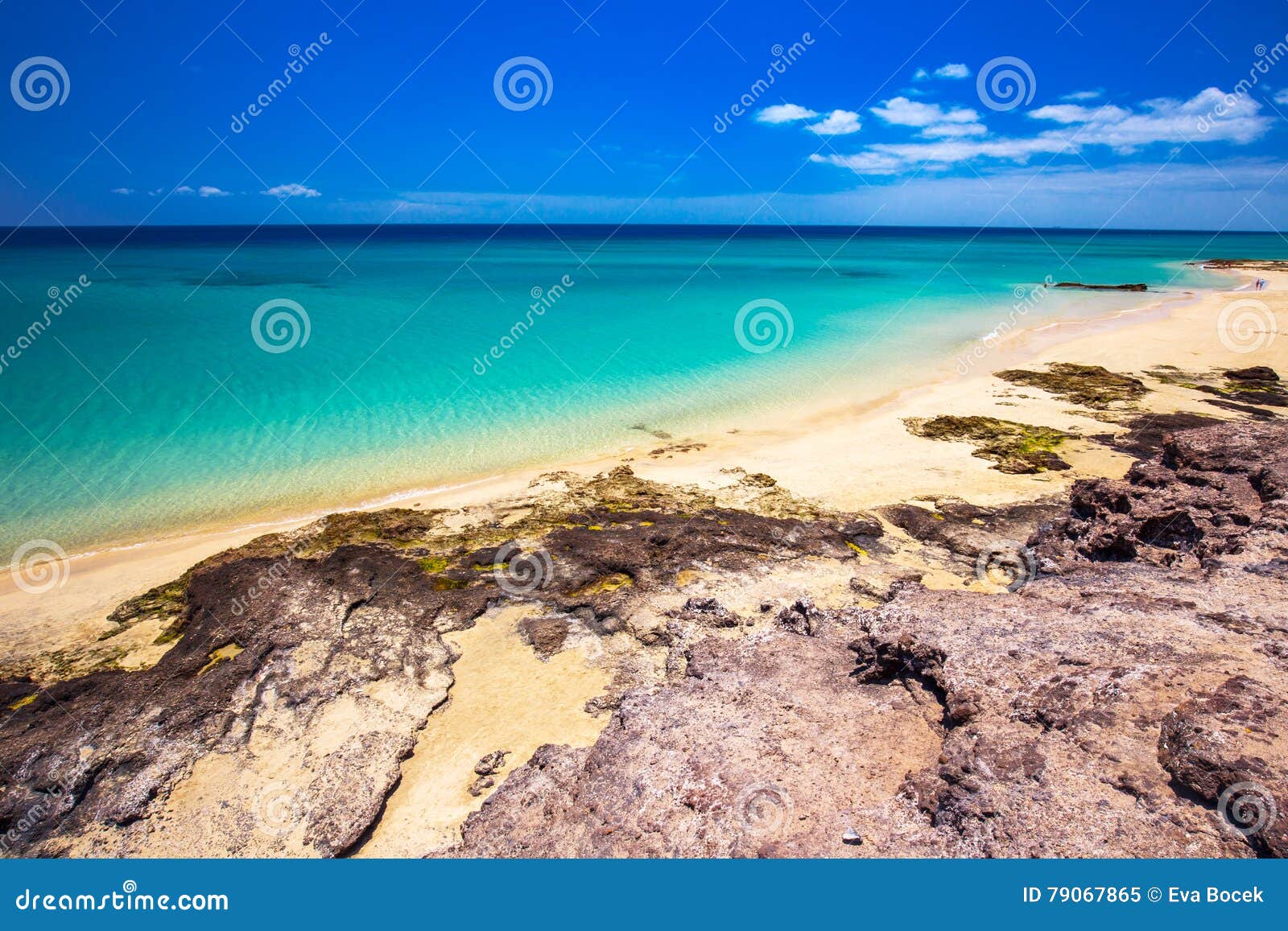 costa calma sandy beach with vulcanic mountains in the background, jandia, fuerteventura island, canary islands, spain.