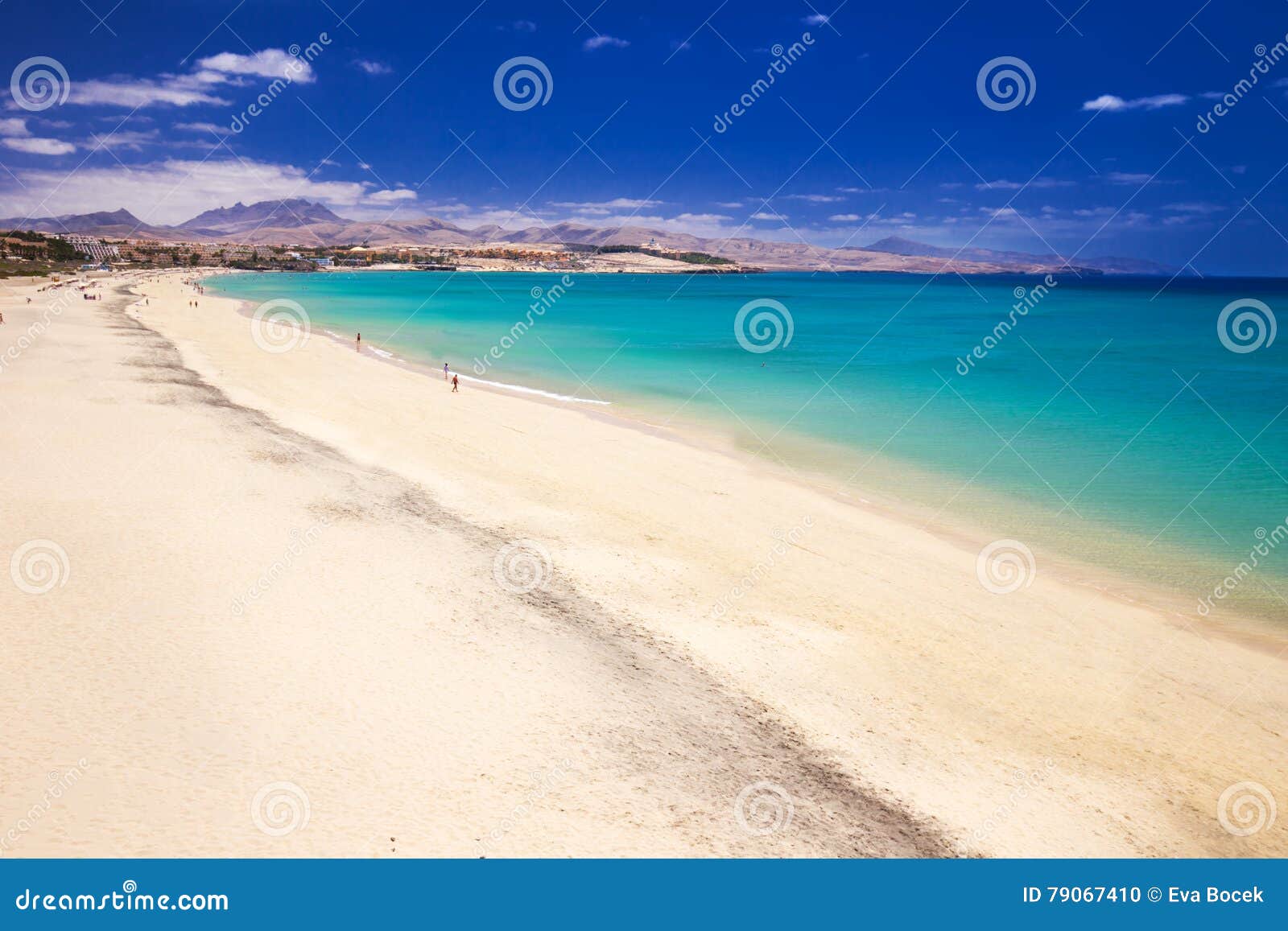 costa calma sandy beach with vulcanic mountains on jandia peninsula, fuerteventura island, canary islands, spain.