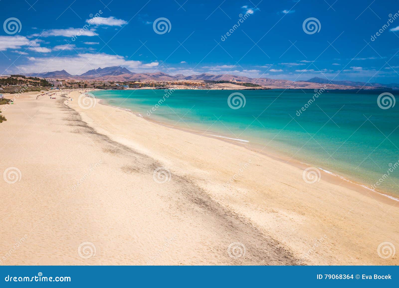 costa calma sandy beach with vulcanic mountains on jandia peninsula, fuerteventura island, canary islands, spain.