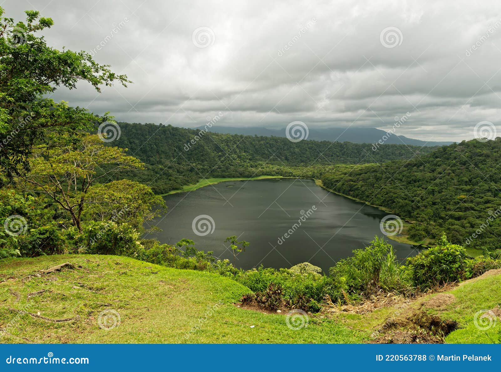 costa rica - laguna hule, volcano crater with the water lake and green rainforest, near arenal volcano, alajuela, rio cuarto,