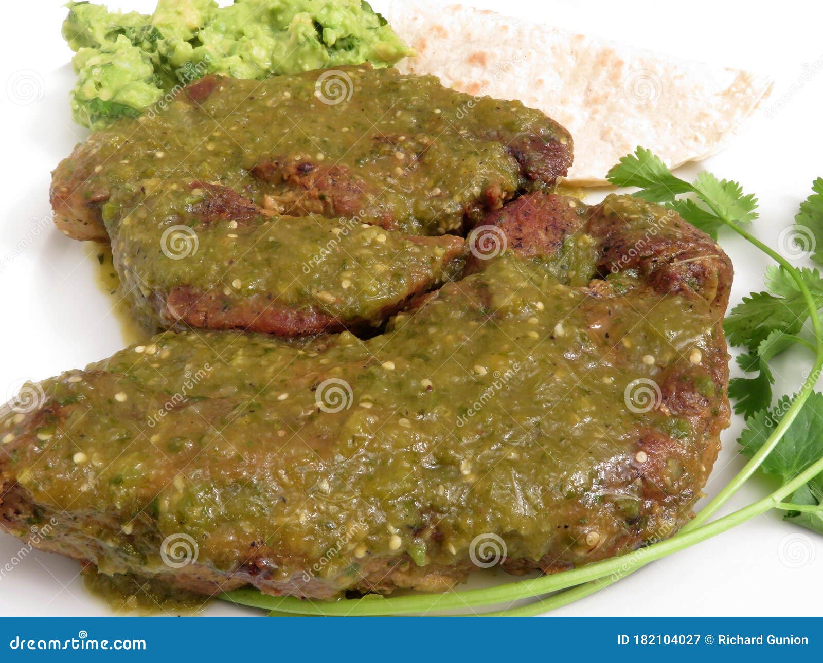 Costillas De Cerdo Para Cenar En Salsa Tomatillo Imagen de archivo ...