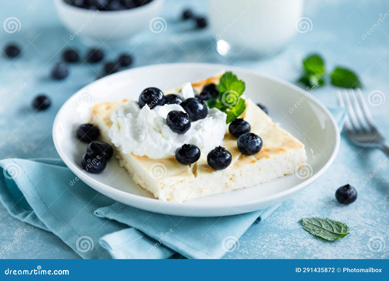 Cottage Cheese Cheesecake Slice with Fresh Blueberry Stock Photo