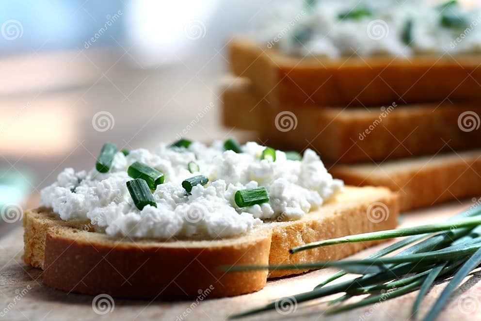 Cottage cheese and chives stock image. Image of bread 25709213