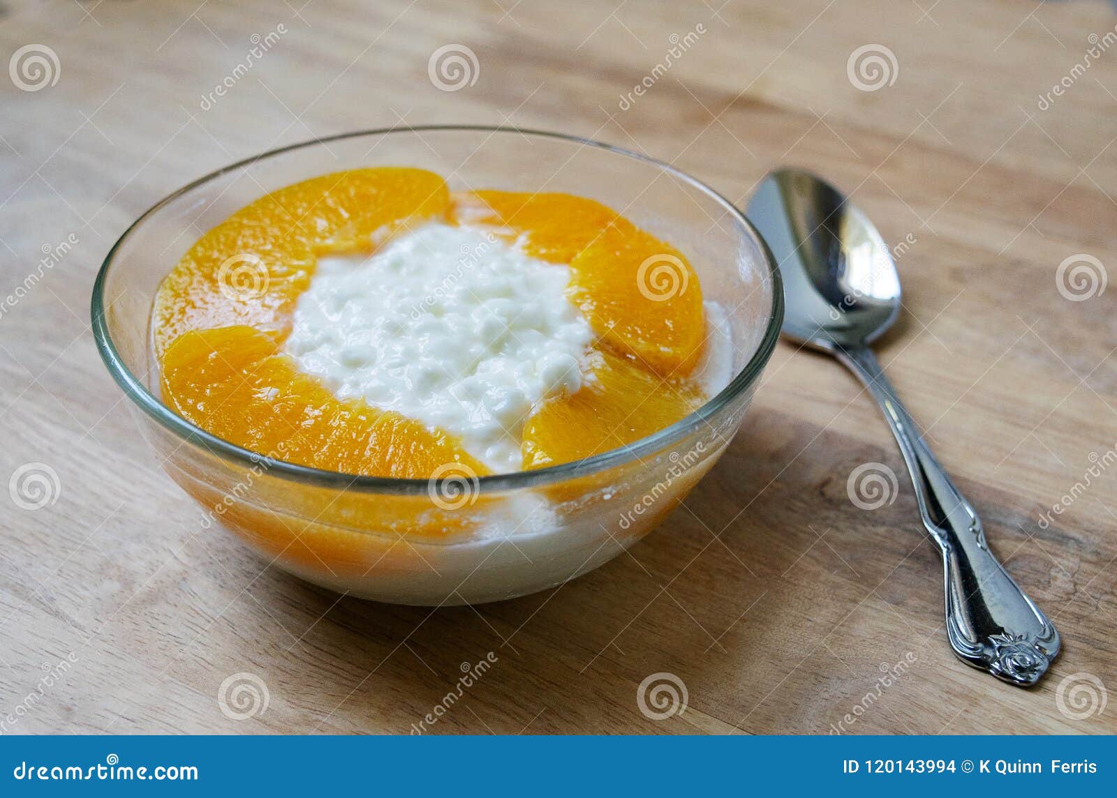 Cottage Cheese And Sliced Peaches For Breakfast Stock Photo