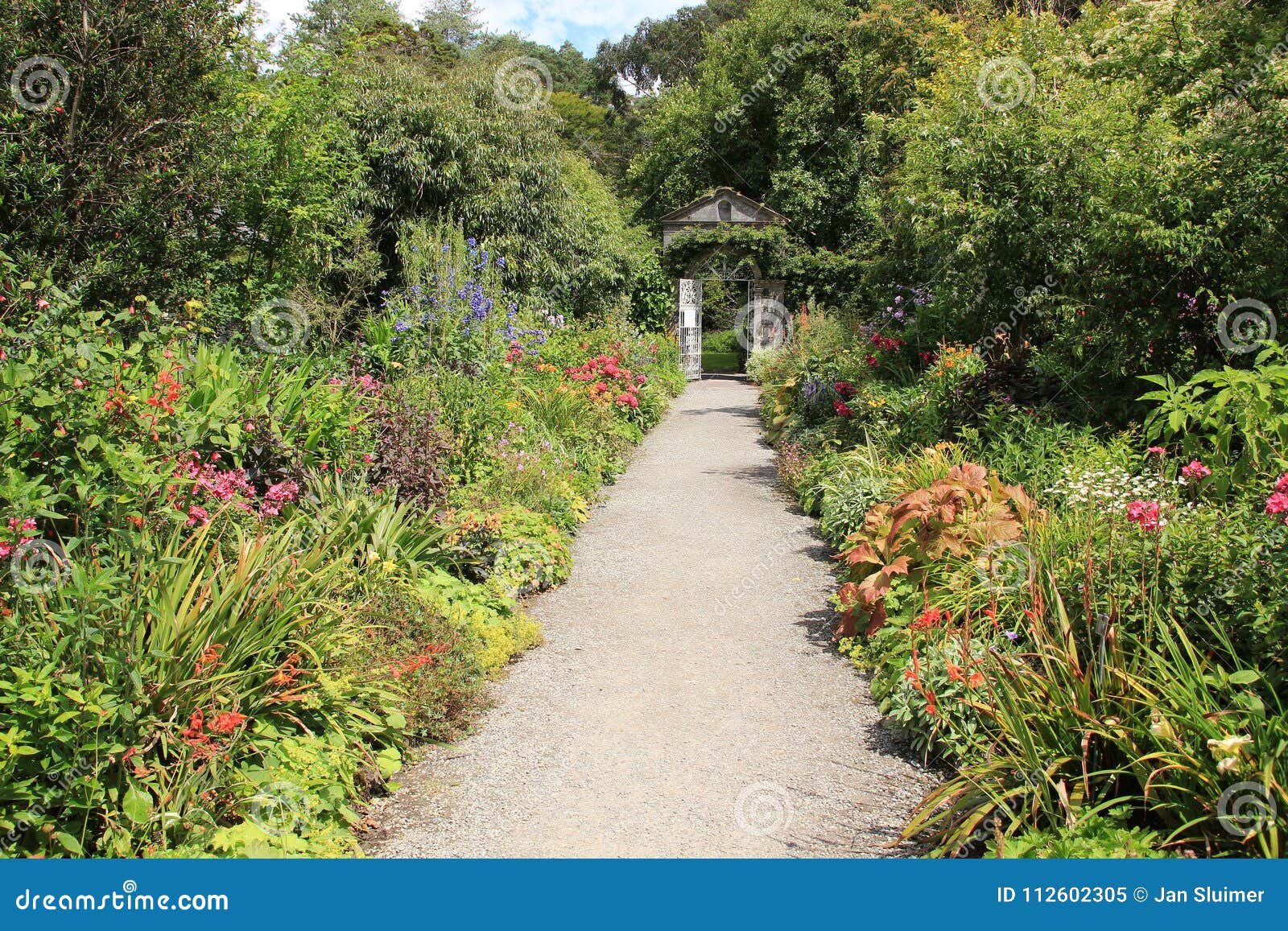 cottage garden on garinish island in ireland in the summer.