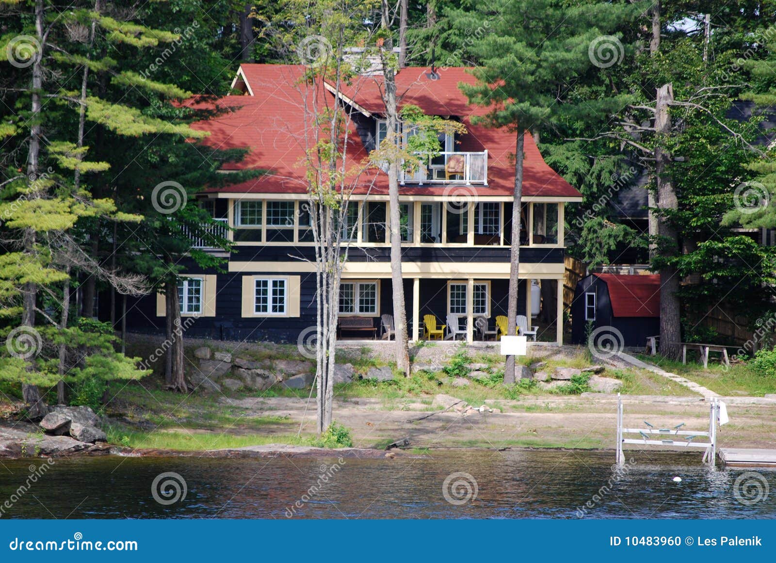 Cottage with red roof stock photo. Image of canada, home 10483960
