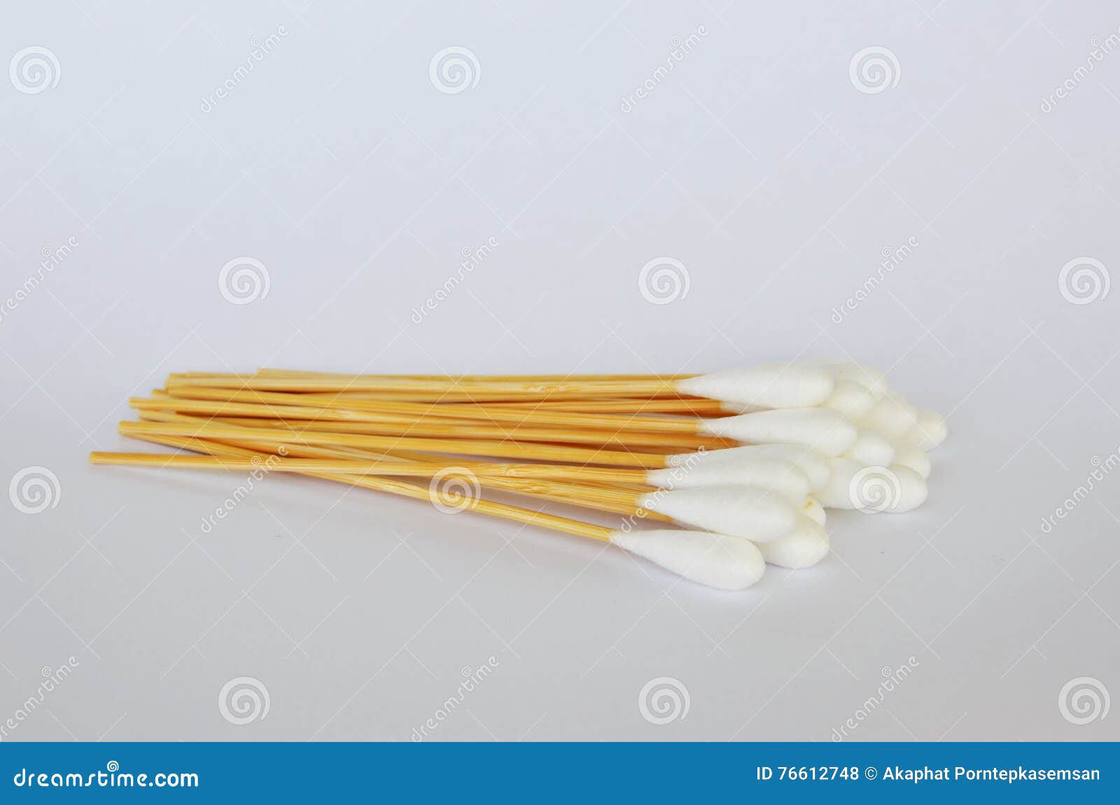 Cotton Bud with Long Wooden Stick on White Background Stock Photo