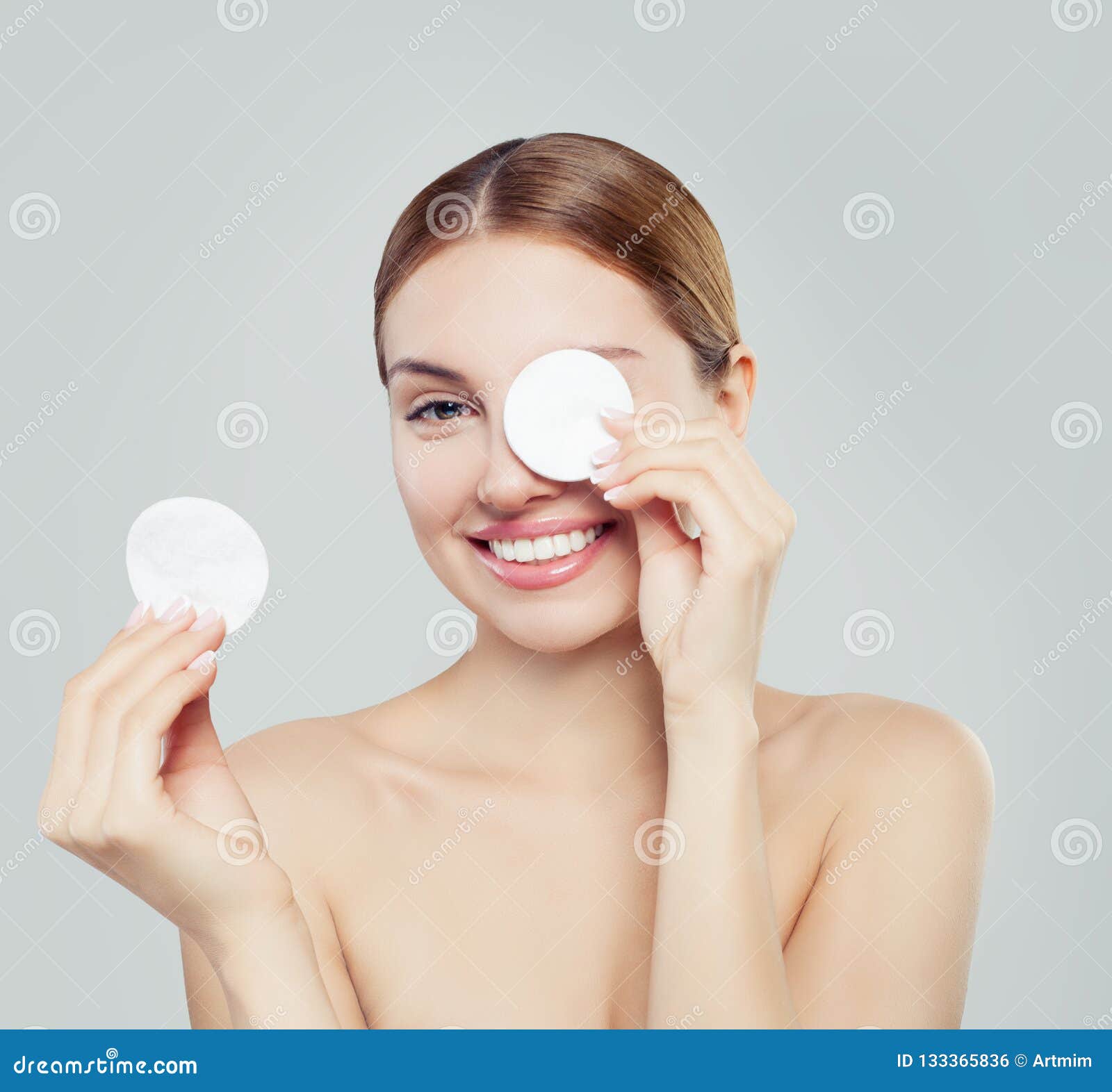 cotton pad woman face, cosmetology and remover makeup.