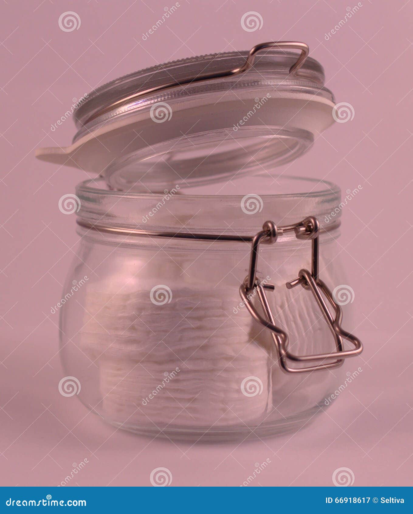 Cotton pads piled in a jar stock image. Image of skin 66918617