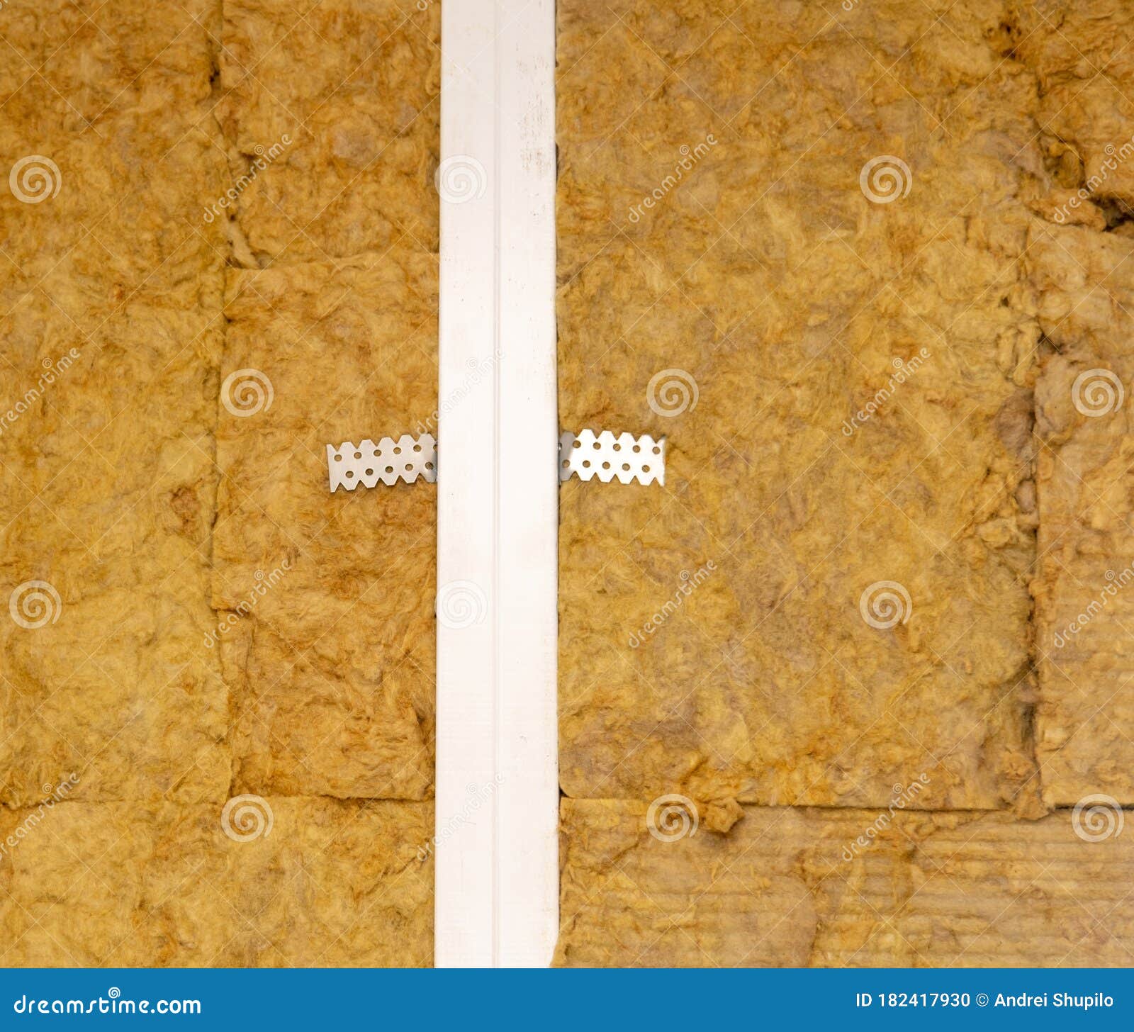 Cotton Wool Insulation in the Wall at a Construction Site Stock Photo