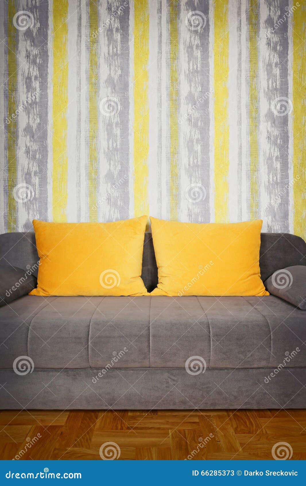Couch with Yellow Pillows and Wallpaper Stock Image Image of pillow