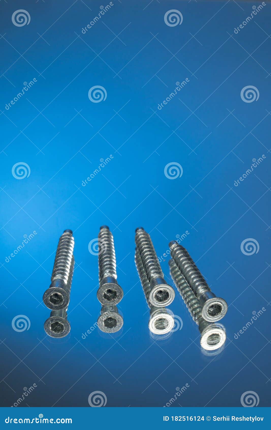Countersunk Wood Screws on a Blue Background Stock Photo Image of chrome, engine 182516124