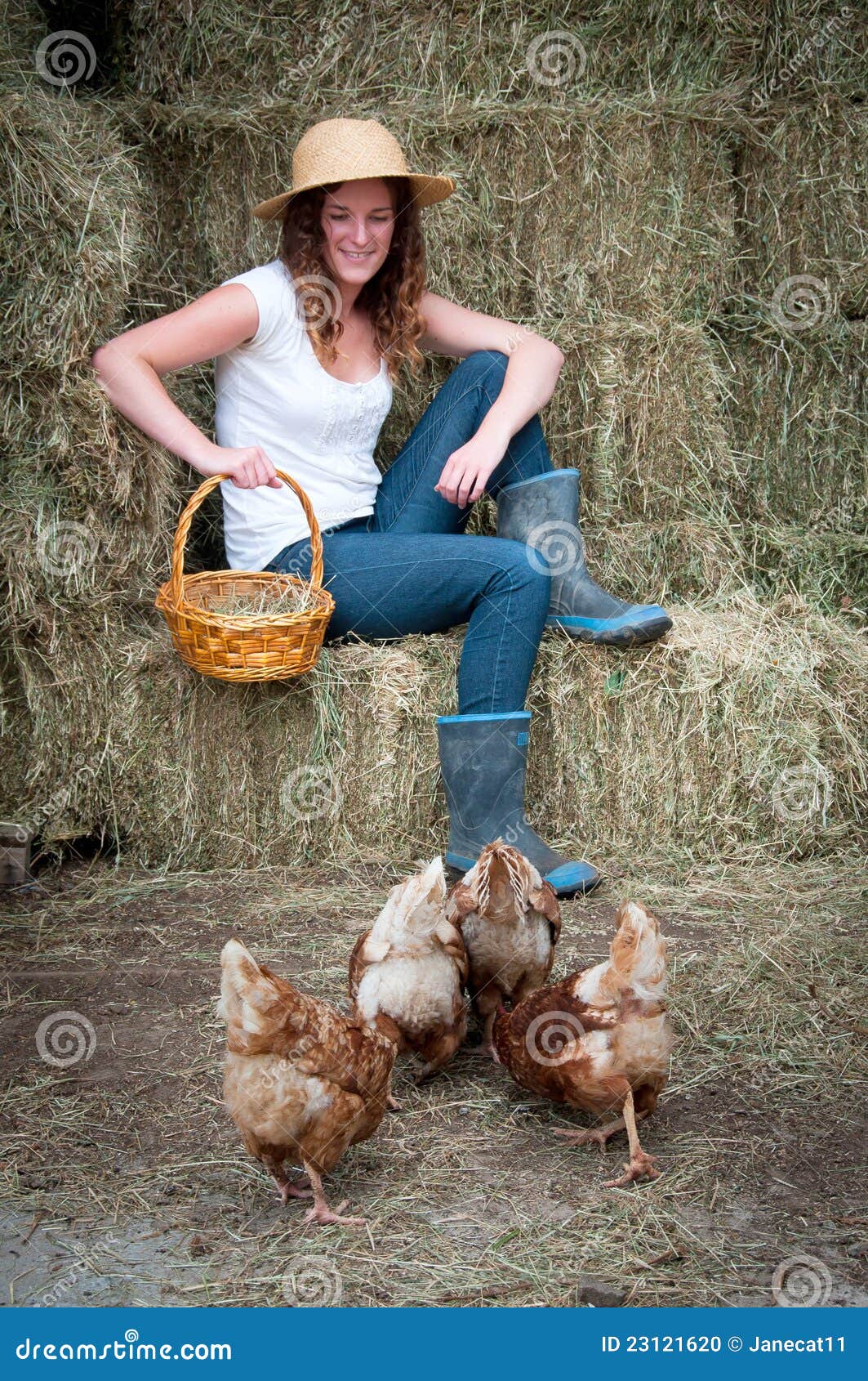 Country Girl with chickens stock photo. Image of eggsm 23121620