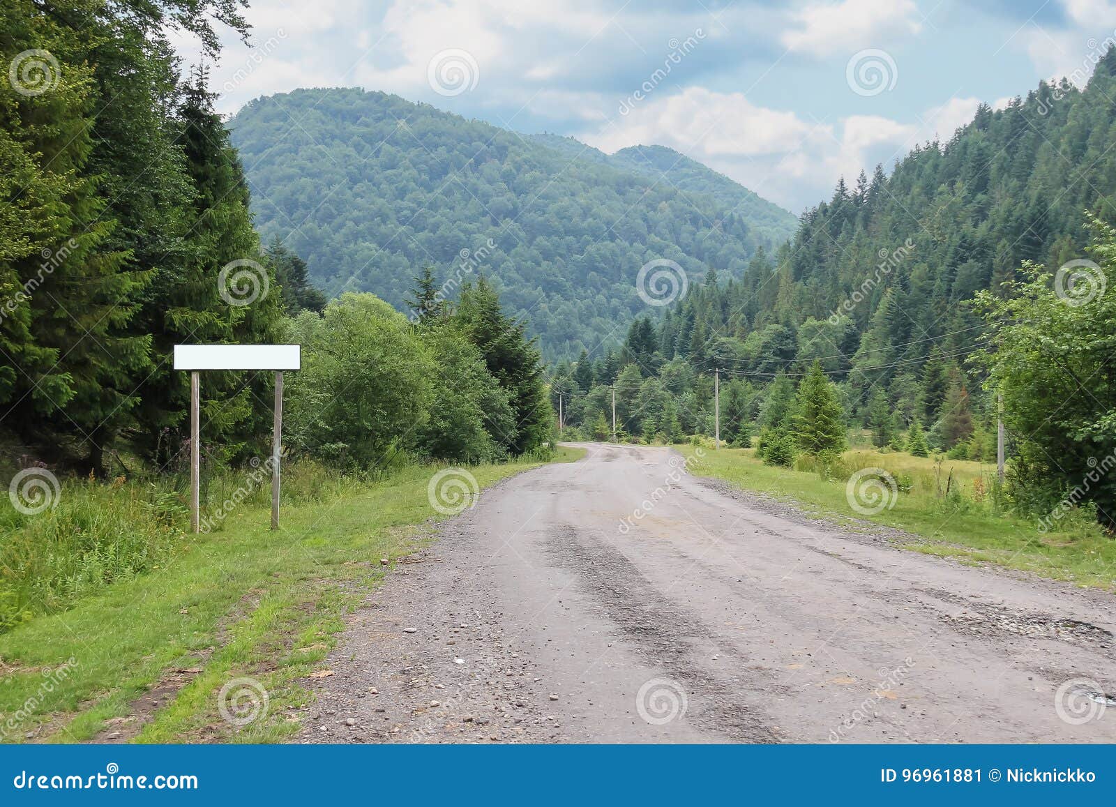 country road between small settlements in the carpathians