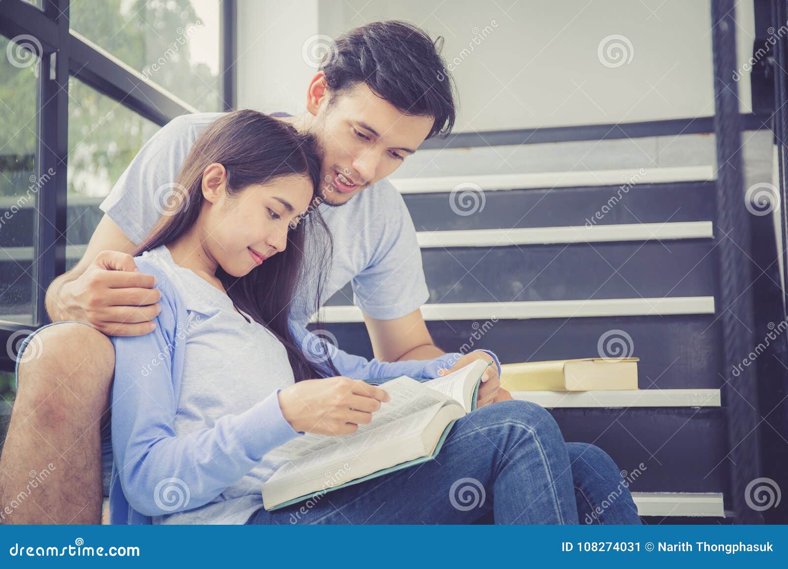 Couple Asian Handsome Man And Beautiful Woman Reading Book And