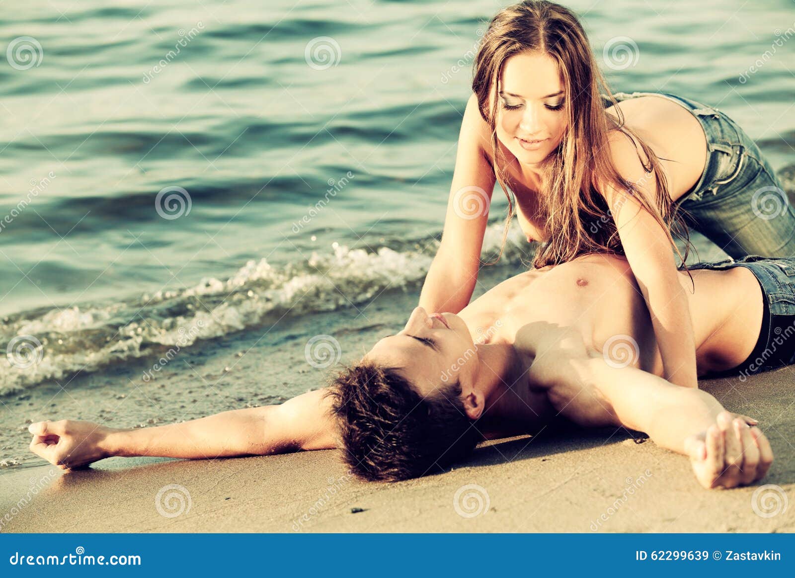 Couple at the beach stock image