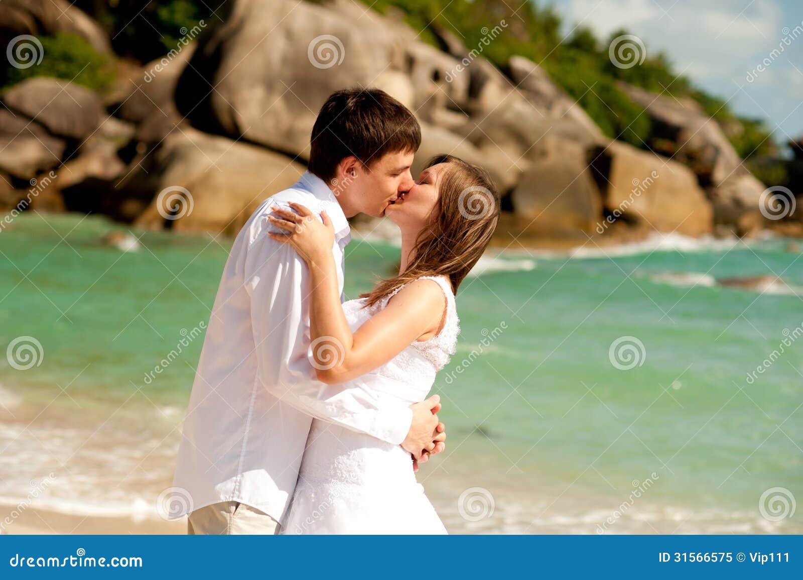 Couple on the beach kiss stock image. Image of marriage 31566575