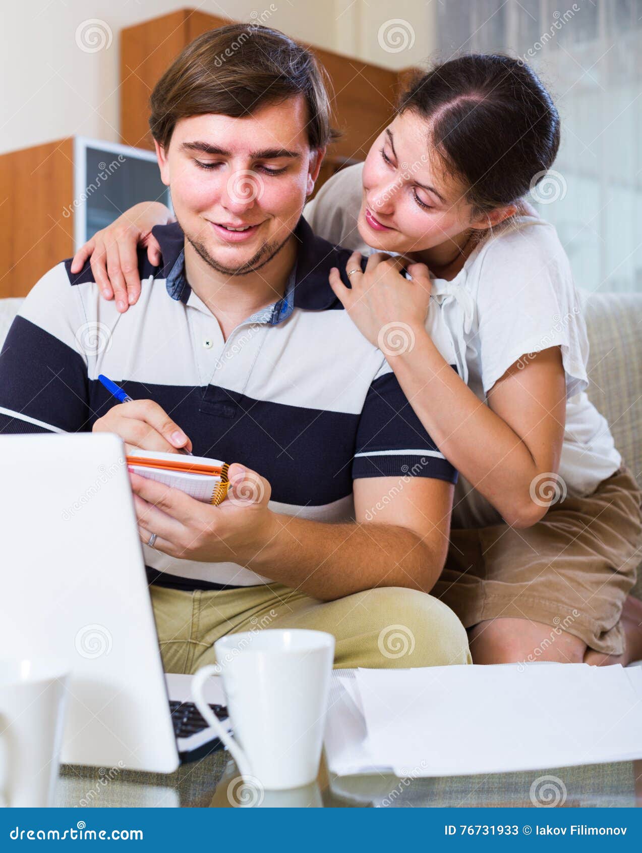 Couple Browsing Web And Making Notes Indoors Stock Image Image Of Order Partner 76731933