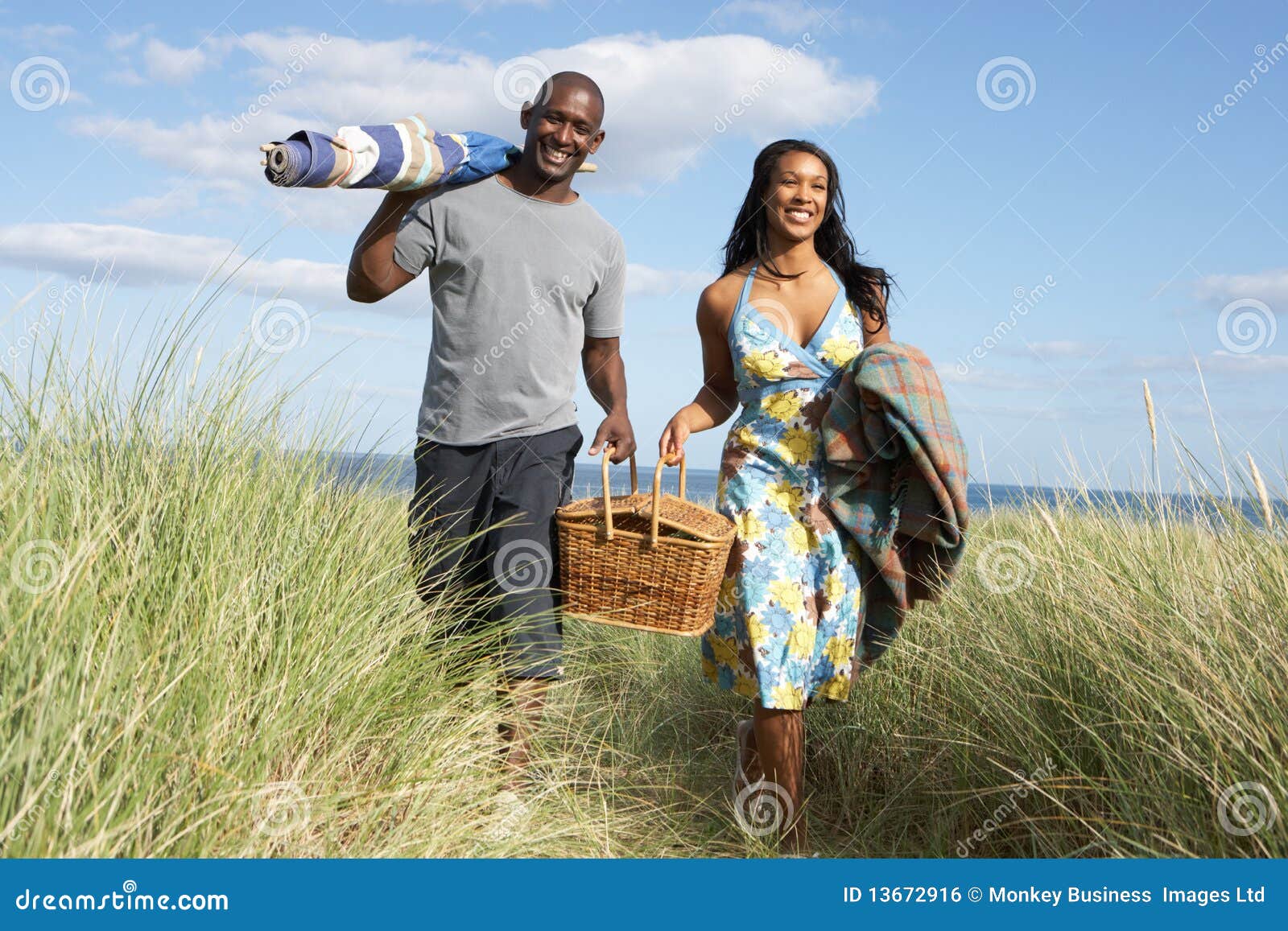 Couple Carrying Picnic Basket Walking Throug Stock Photo Image of