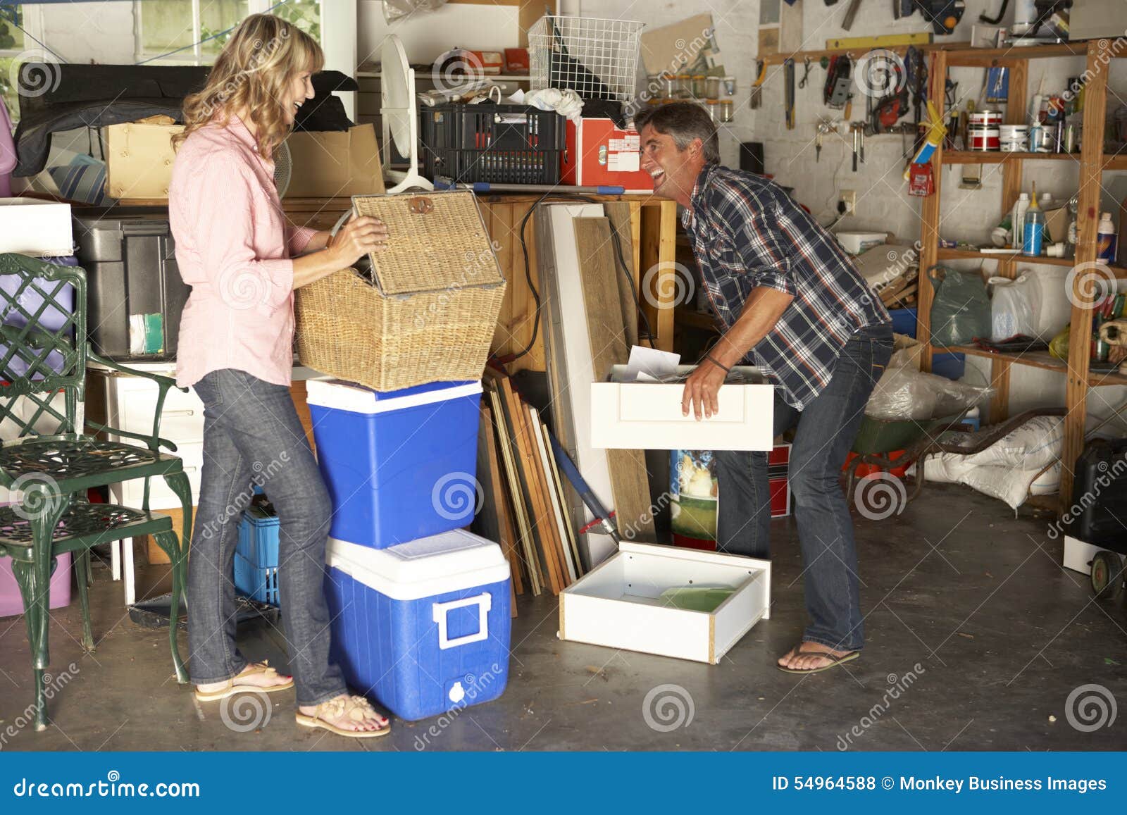 Couple Clearing Garage for Yard Sale Stock Photo Image of tidying, clearance 54964588