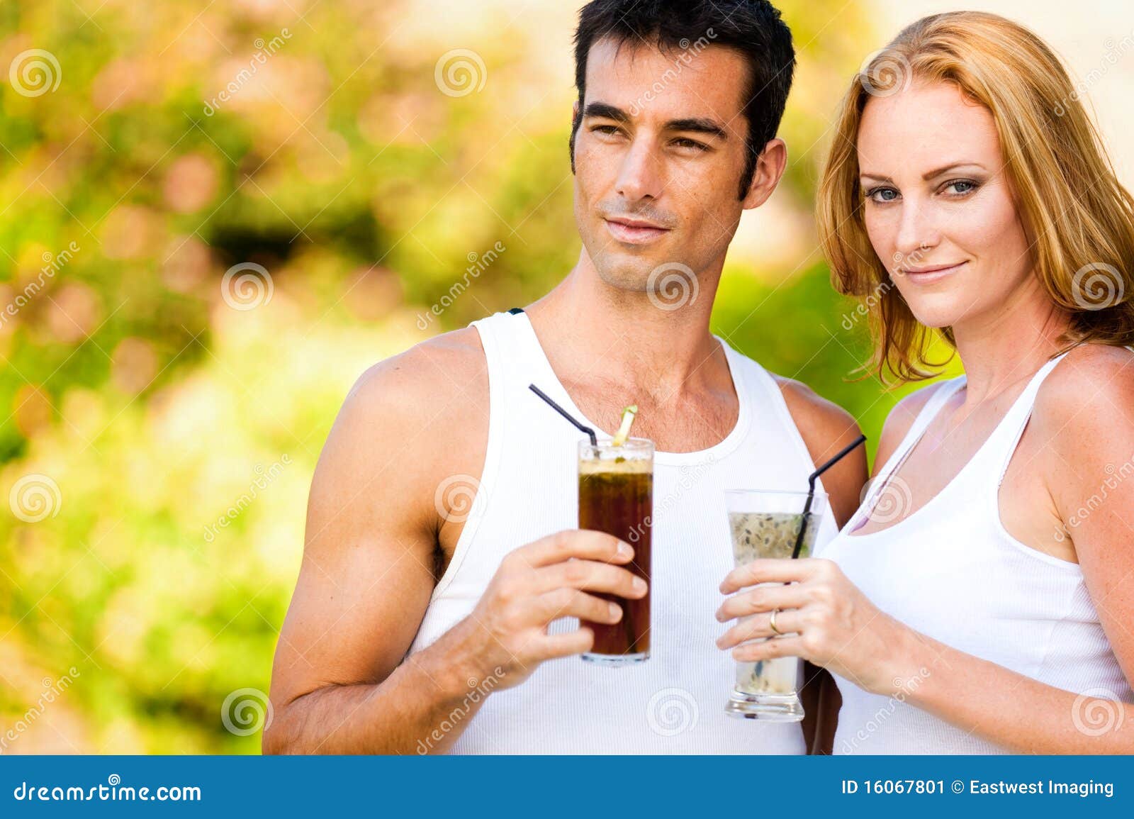 Couple with Cocktails stock image. Image of caucasians 16067801