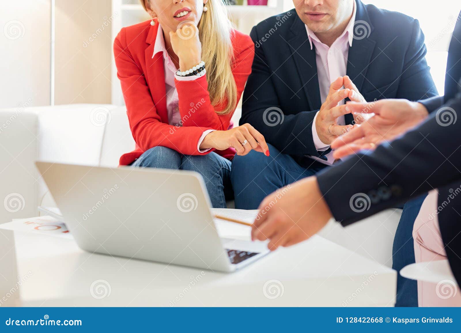 couple consulting financial adviser for investment plan