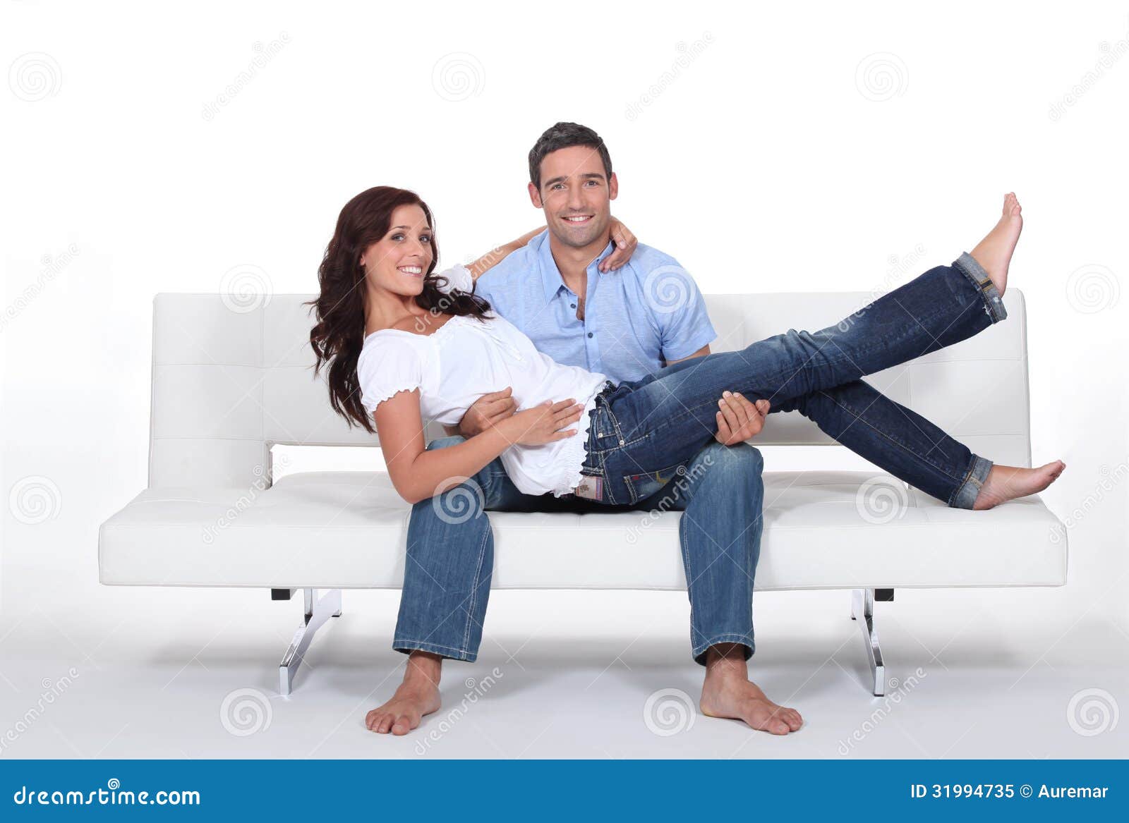 Couple on a couch stock image. Image of couple, love 31994735