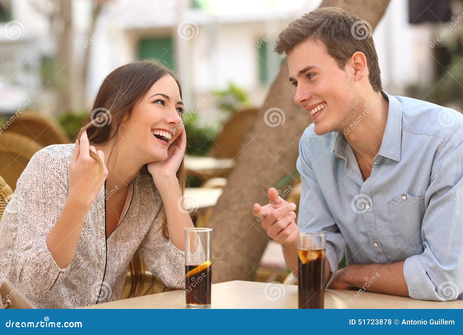 couple dating and flirting in a restaurant