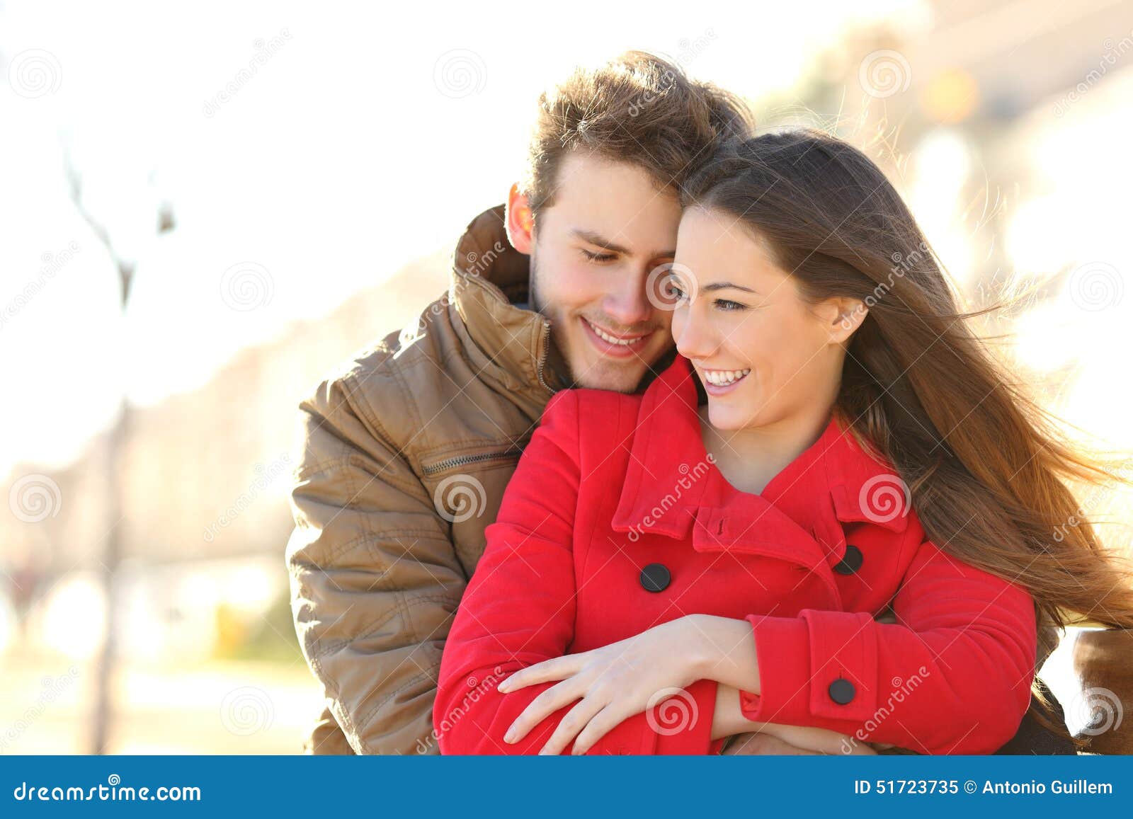 couple dating and hugging in love in a park