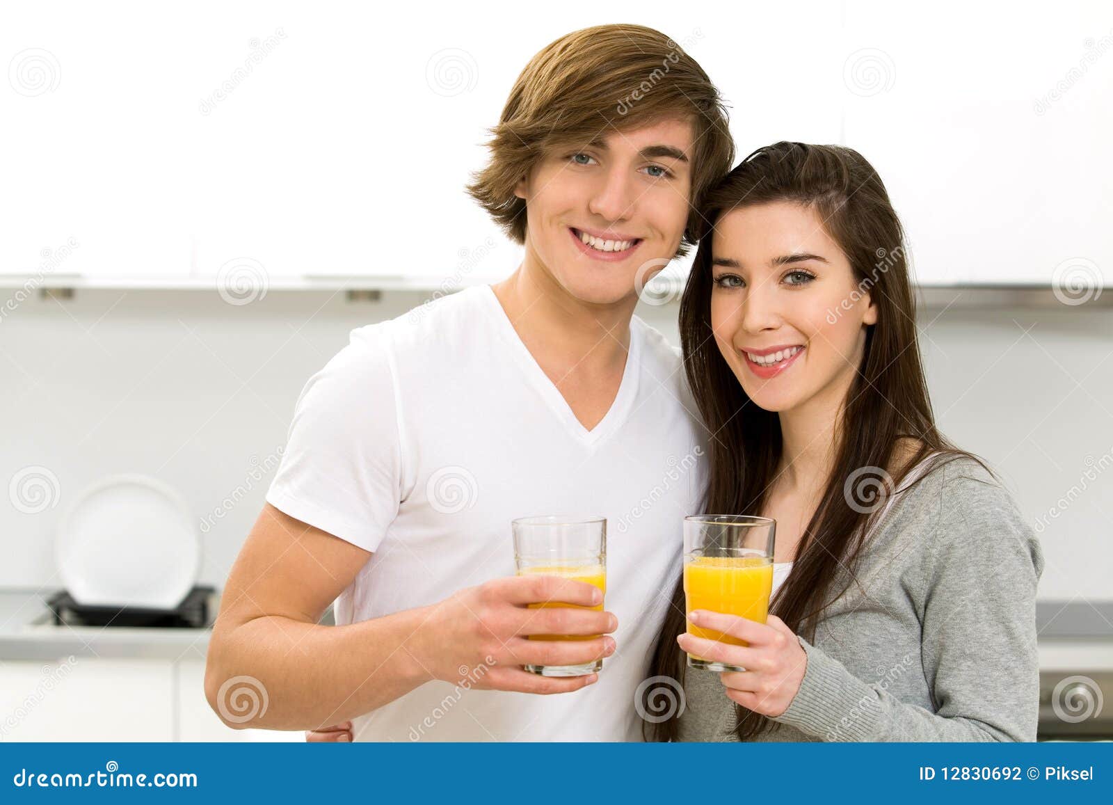 Couple Drinking Orange Juice Stock Photo Image of drink, woman 12830692