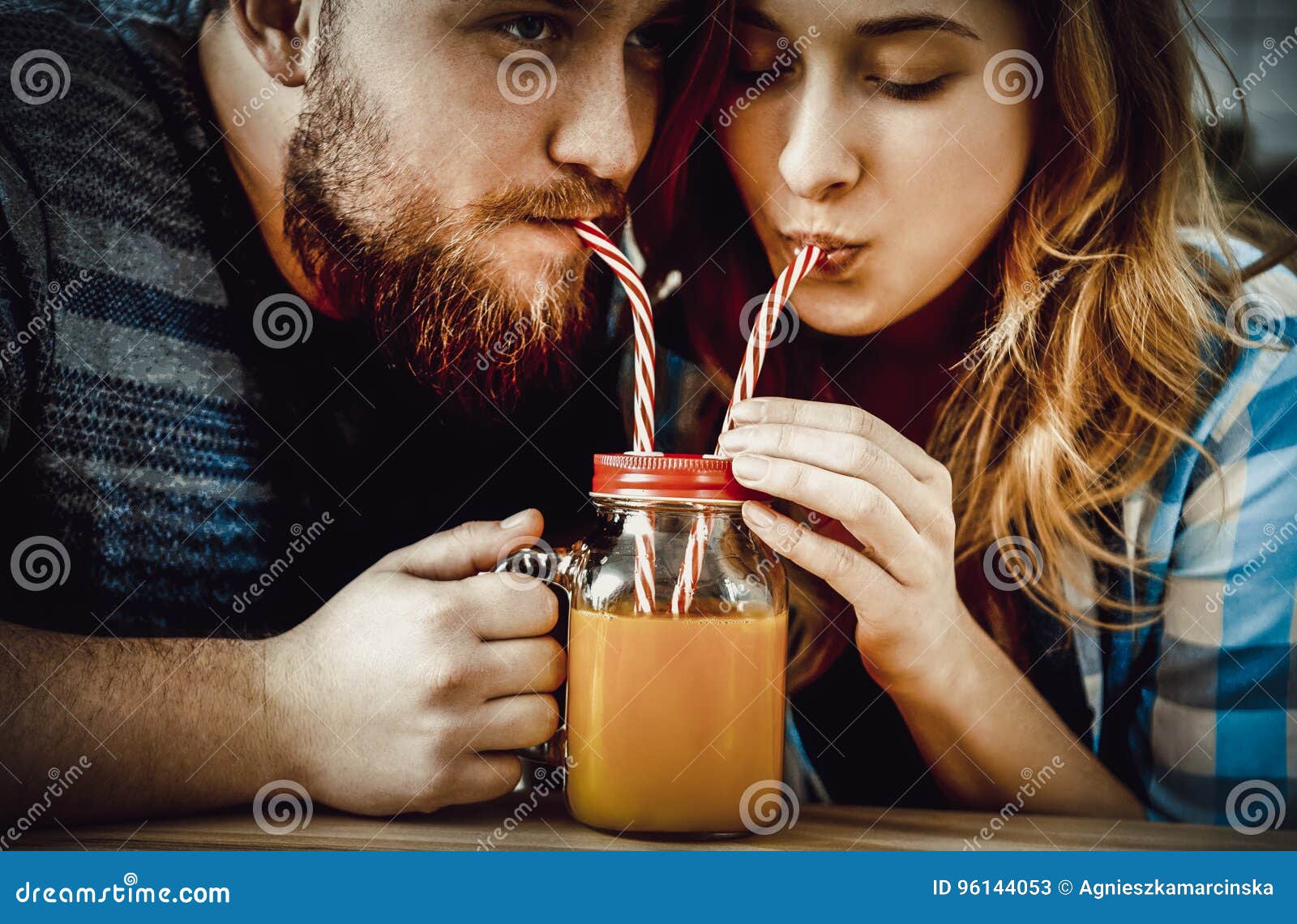couple drinking orange juice