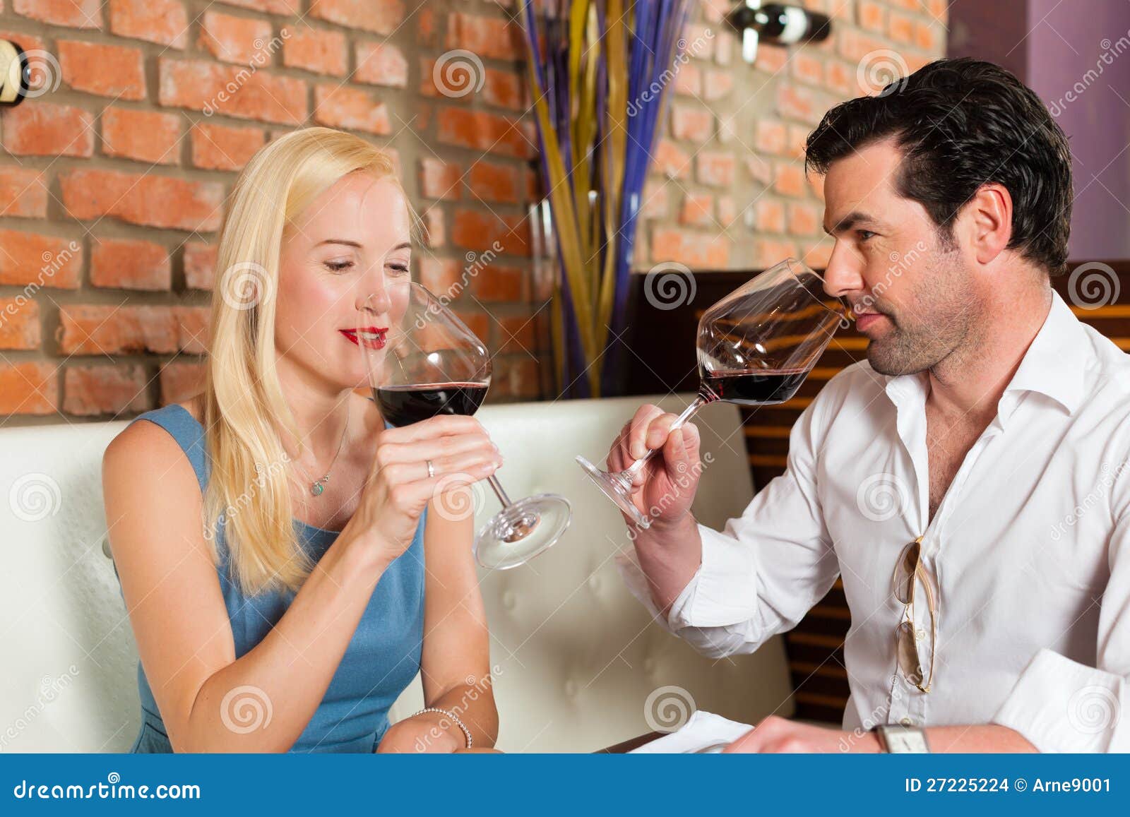 Couple Drinking Red Wine In Restaurant Or Bar Stock Photo Image 27225224