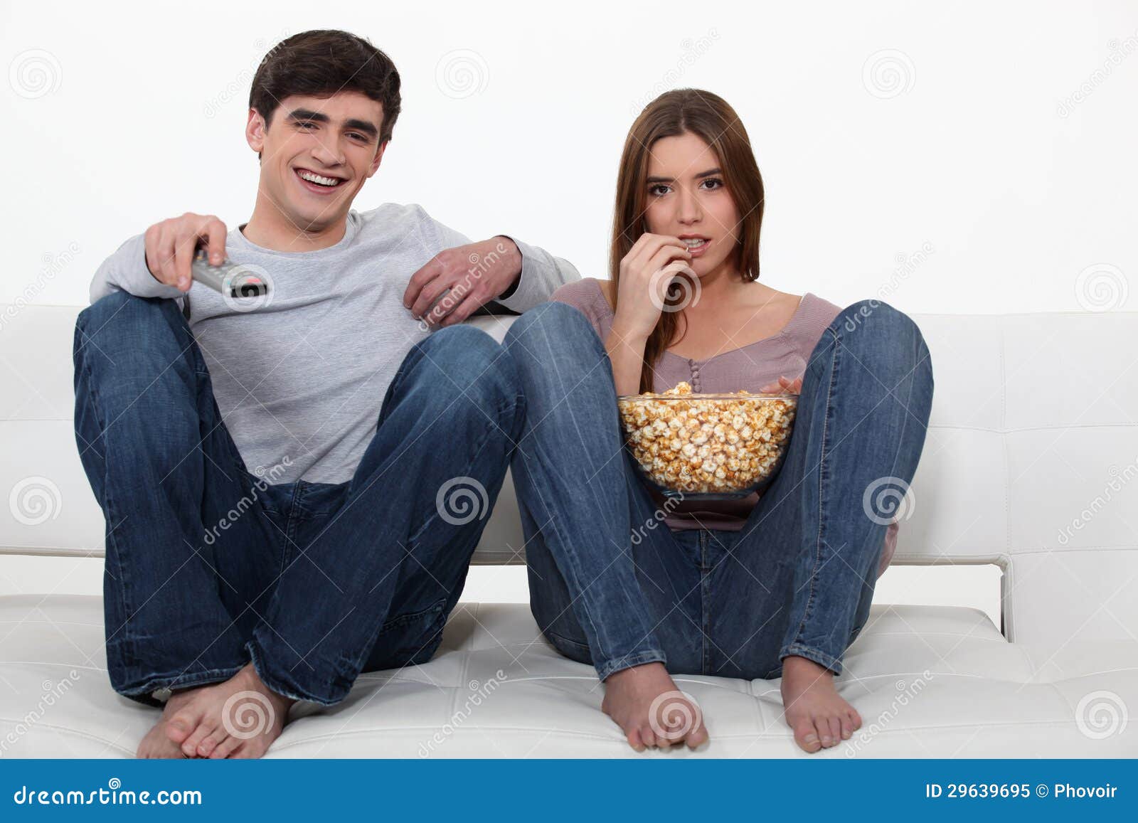 Couple eating popcorn stock image. Image of family, fastfood 29639695
