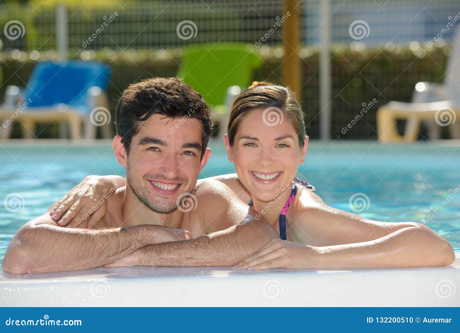 Couple Embracing in Swimming Pool Stock Photo Image of bikini