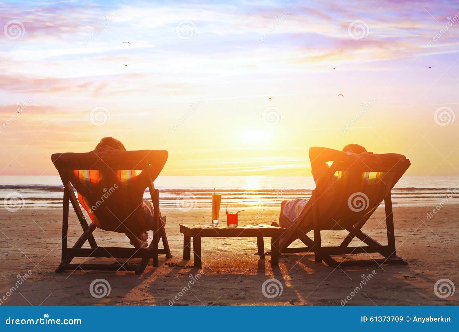 couple enjoy luxury sunset on the beach