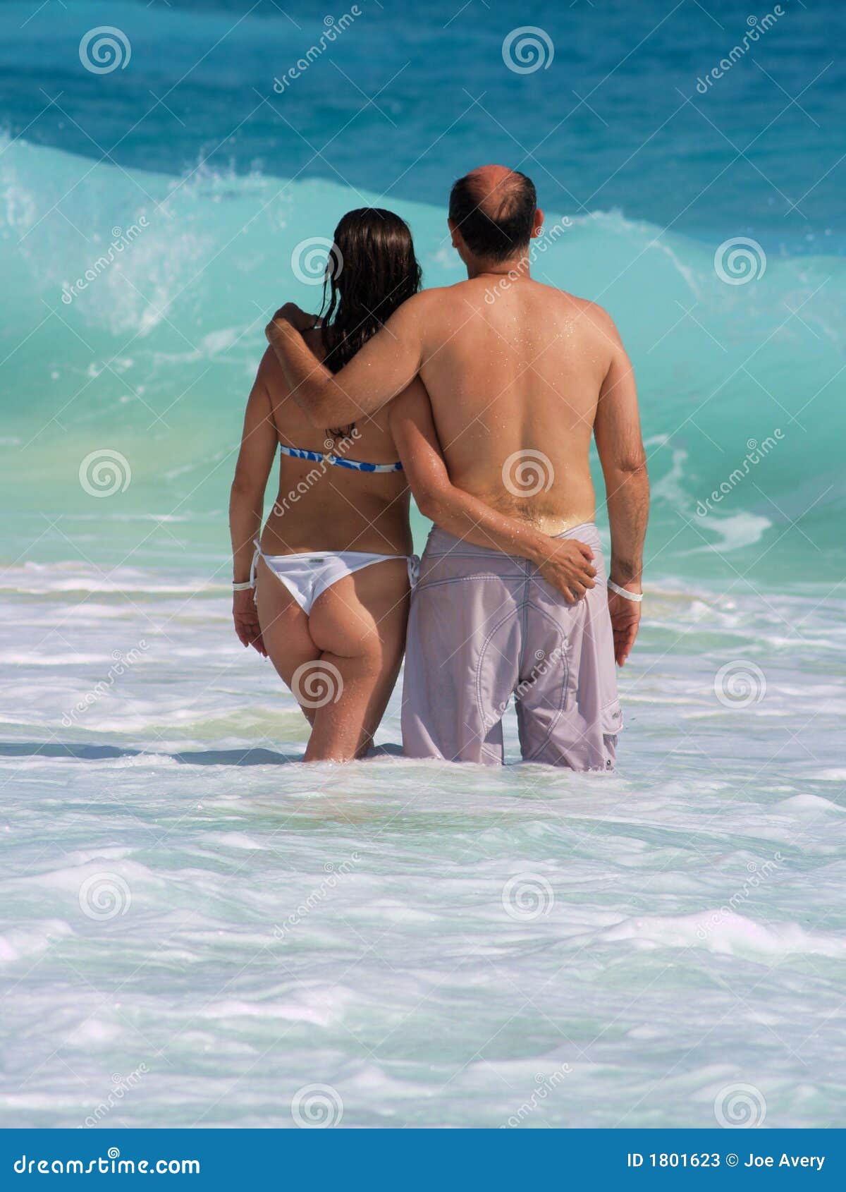 Couple enjoying the Cancun cCarribean View. Couple embraced in the whole vacation in Cancun