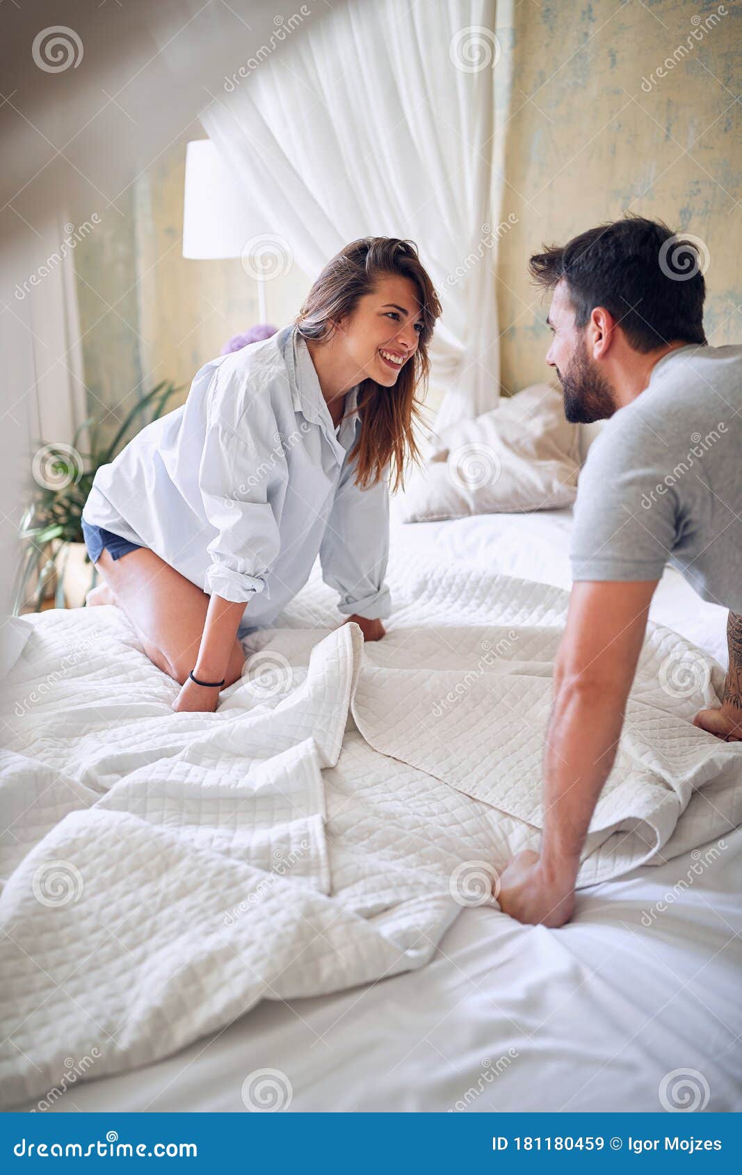 couple  enjoying intimate moment at morning in bed