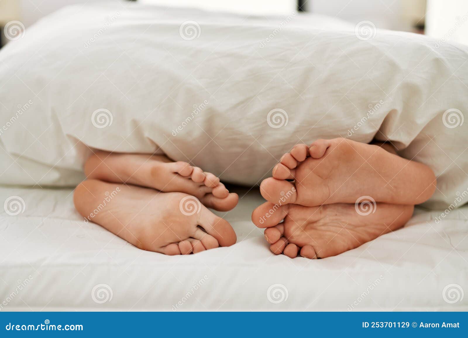 Couple Feet Under Sheets on the Bed at Home Stock Image Image of indoors, bedroom 253701129
