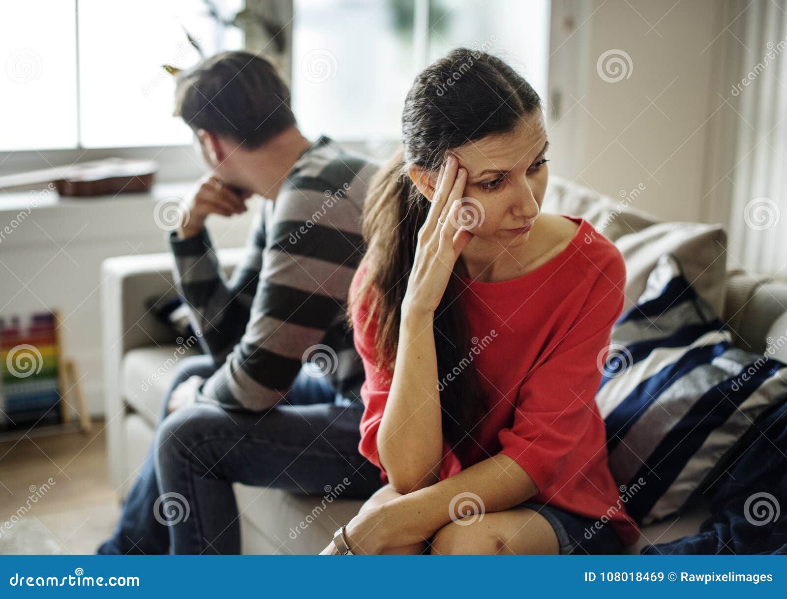 couple fighting with depressed face expression