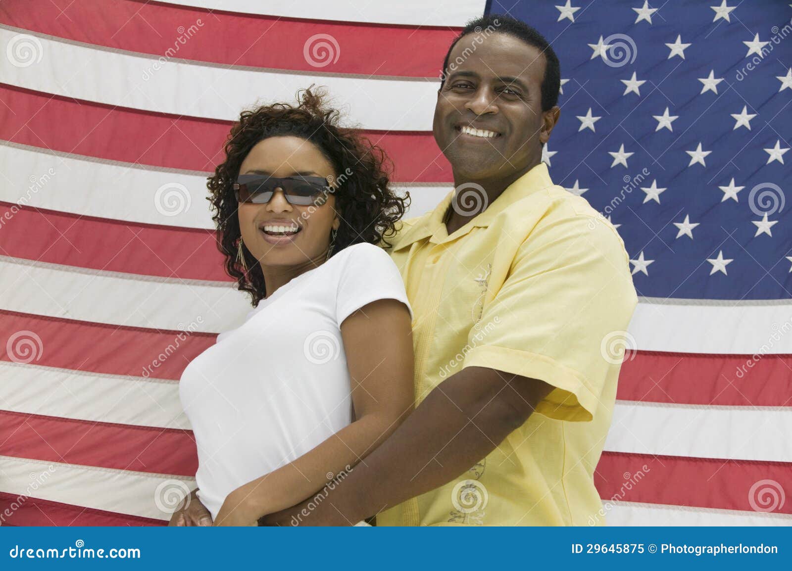 Couple in Front of an American Flag Stock Image Image of person