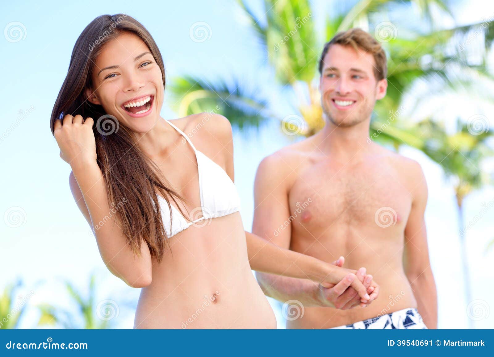 Couple Fun at Beach Holding Hands Stock Image image picture