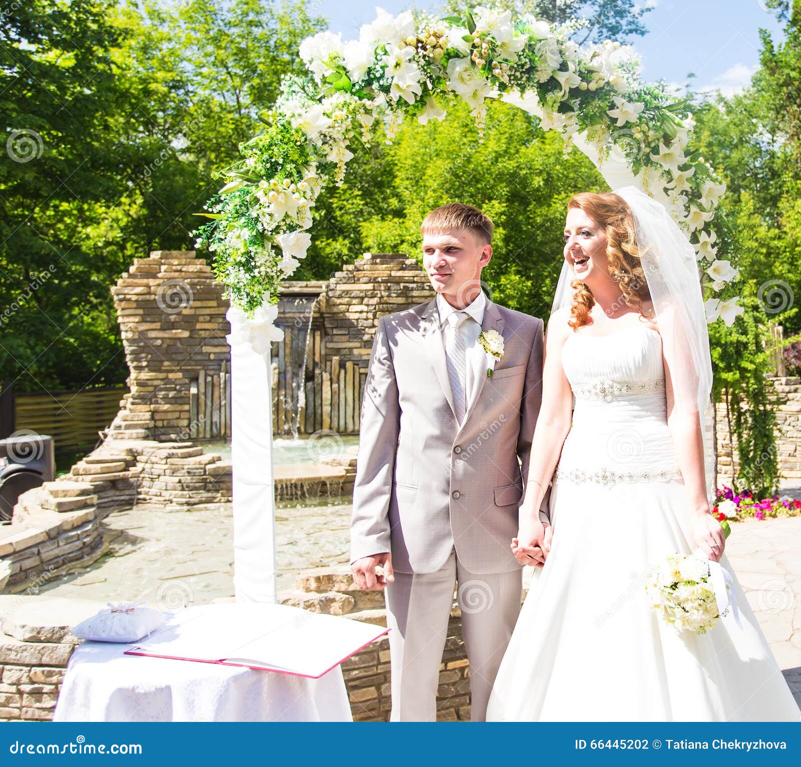 Couple Getting Married at an Outdoor Wedding Ceremony Stock Photo Image of newlyweds