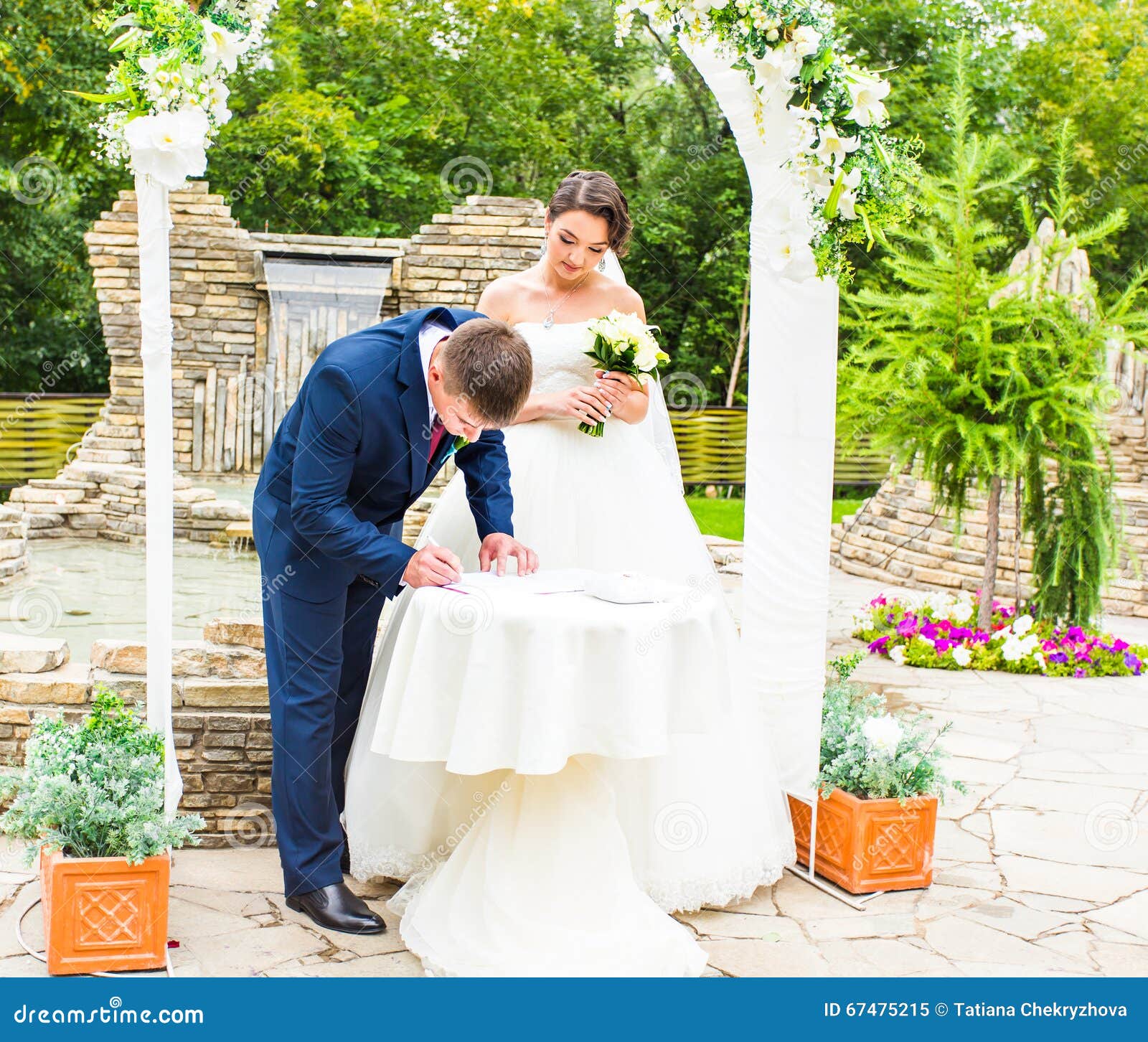 Couple Getting Married at an Outdoor Wedding Ceremony Stock Image Image of bouquet, groom