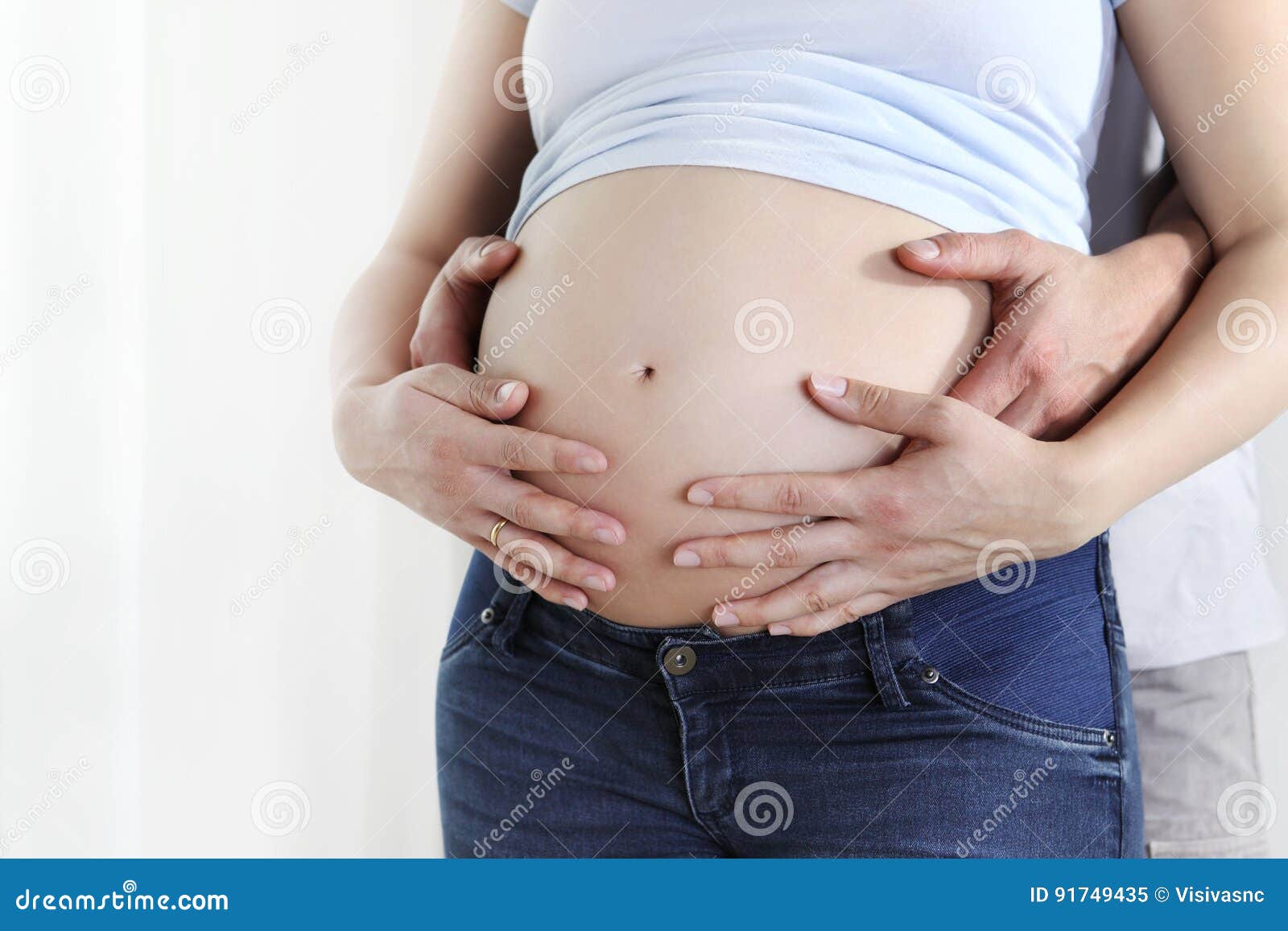 Couple Hands on the Pregnant Belly, Concept of Pregnancy Stock ...