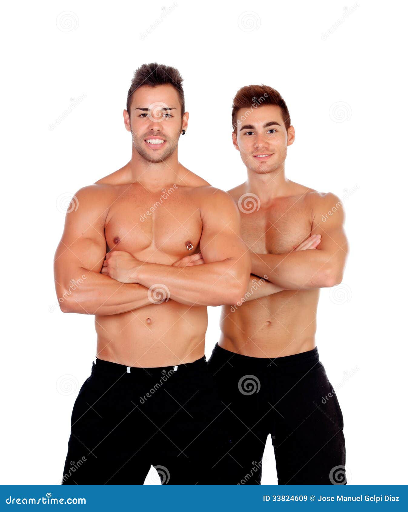 Couple of handsome muscled men isolated on a white background