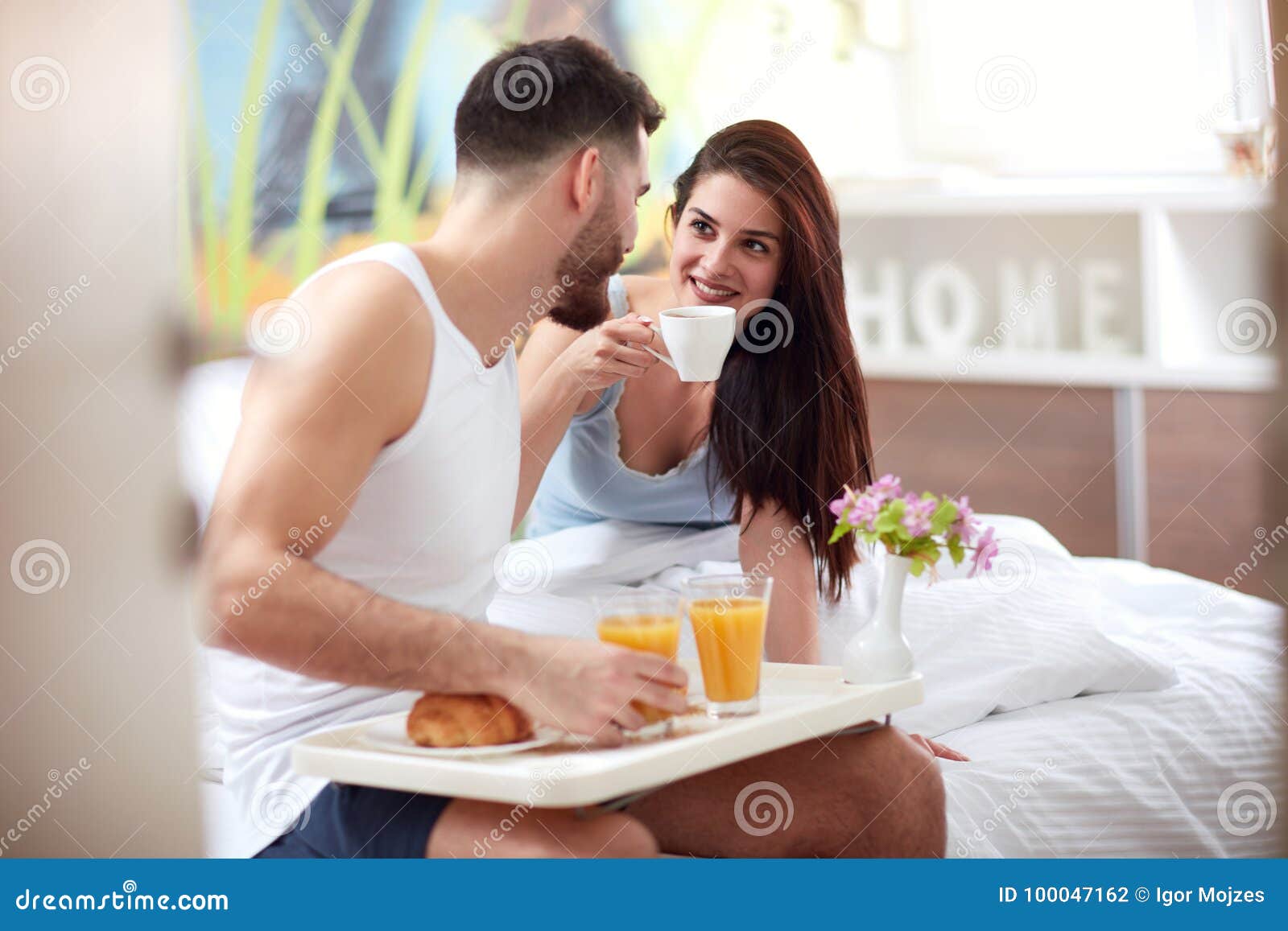 Couple Have Romantic Breakfast in Bed Stock Photo Image of horizontal, cheerful 100047162