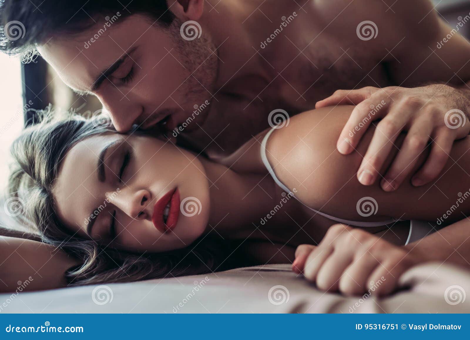 Couple Having Sex On Bed