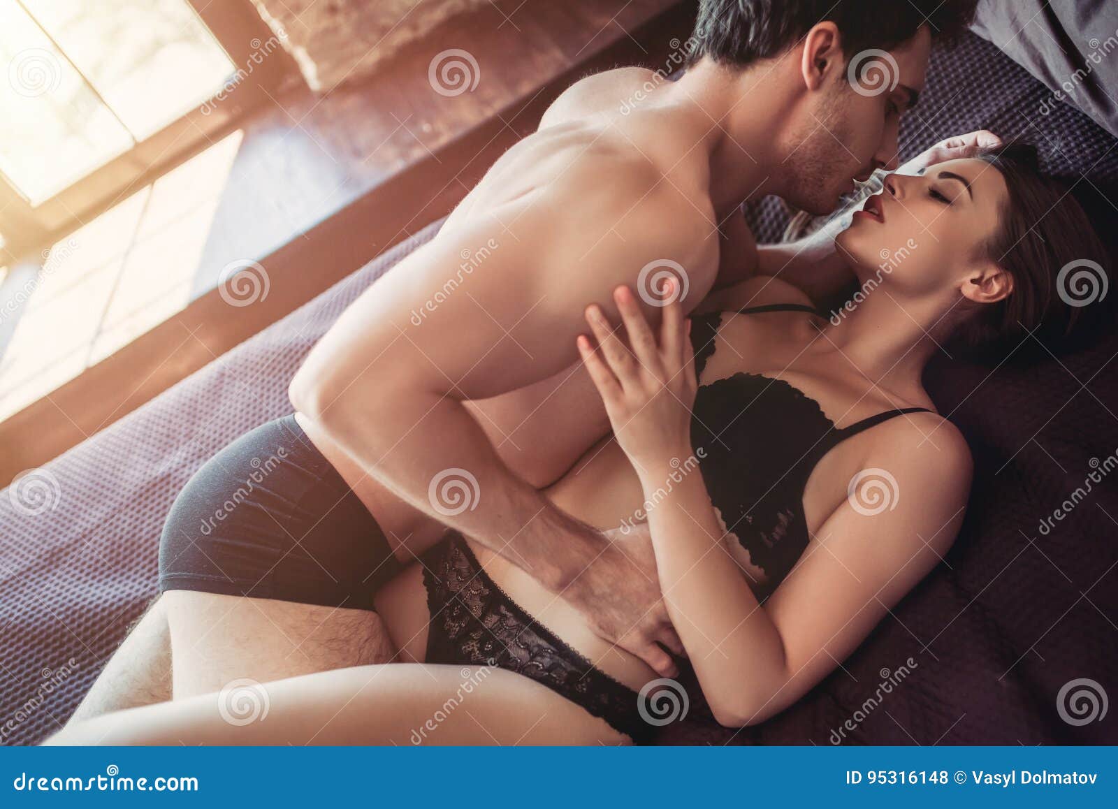 Couple Having Sex On Bed